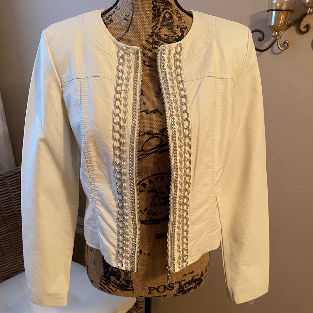 Beautiful short jacket with bling.